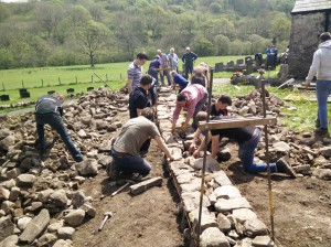 Young farmers dry stone walling